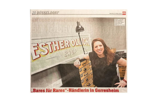 Frau in Werkstatt für Schönes Düsseldorf-Gerresheim, vor Schild 'Esther Ollick Shop', DIY Workshop